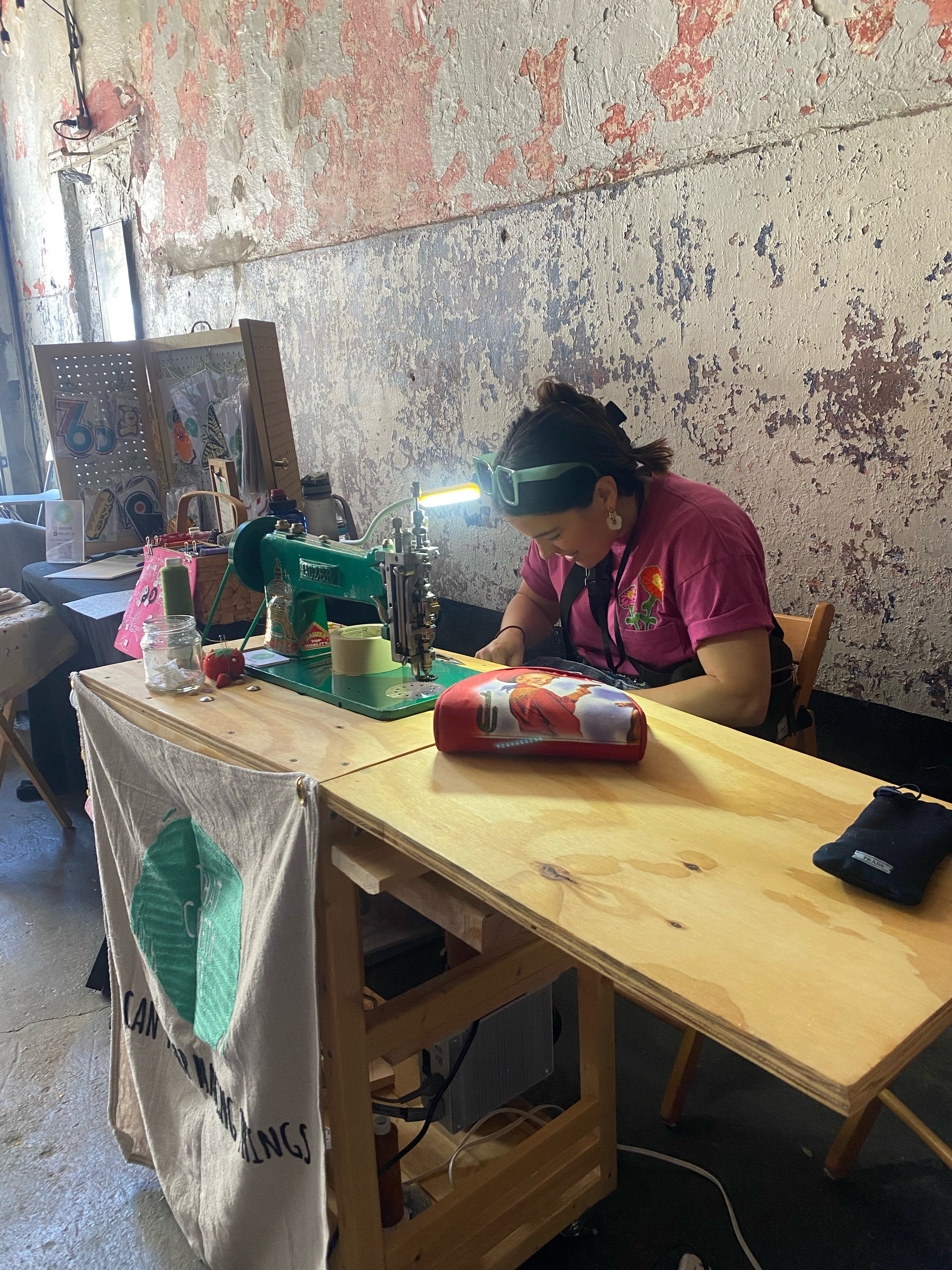 Live chainstitch embroidery event featuring That Crafty One stitching on site at Cartesian Brewery.